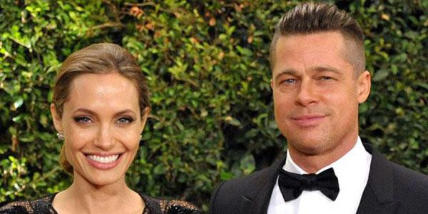 Angelina Jolie offre une île en forme de coeur à Brad Pitt...(Angelina Jolie et Brad Pitt à Los Angeles le 16 novembre 2013)